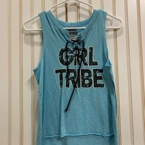 Blue shirt with black bold words “Girl Tribe”